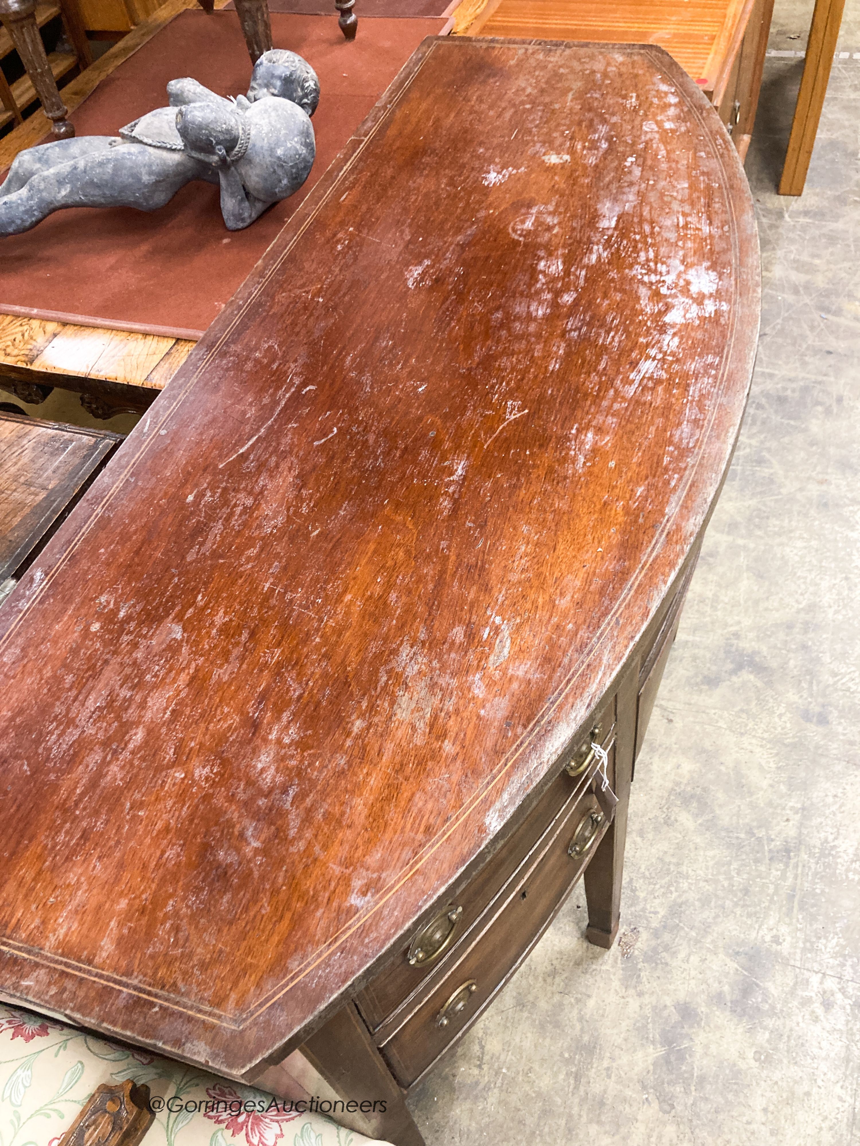 A George III mahogany bow front sideboard, W.150cm D.62cm H.90cm